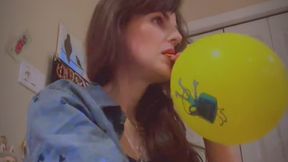 Blowing up birthday balloons
