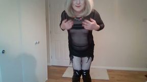 See-through dress, fishnets and latex boots