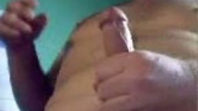 I love stroking my swollen dick in front of my webcam