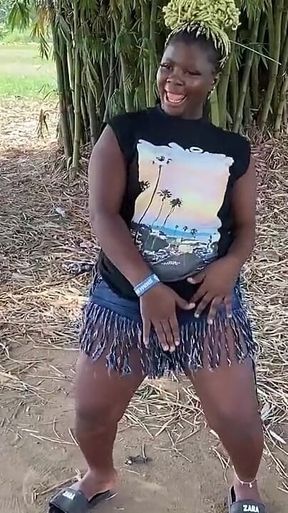 African Ebony Sexy Black Girl Dances in Public with Laughter