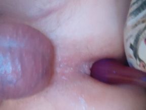 lying in bed and riding a dildo and caressing my asshole with my cock