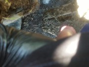 Pov lad unzips and flops it out to take a yellow piss next to muddy tire