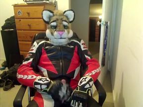 Sli paws off in motorcycle leathers