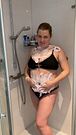 Sexy girl with a shower foam