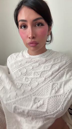 White woman in white sweater