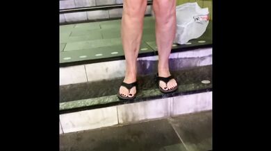Her pierced clit glistens while flashing in public with a tail butt plug