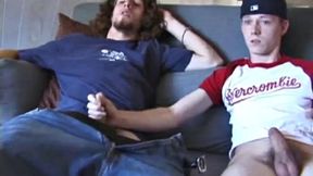 We join Adam and EJ with their dicks already out and jeans down. Curious EJ leans over and starts stroking Adam's cock. Adam helps EJ out by going down on him. EJ wants to try cock sucking, so he takes Adam's cock into his mouth.