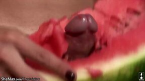 Lovely shemale pounds a watermelon so hard that she cumshots