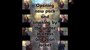 Opening New Pack And Smoking By The Water In Dress And Jean Jacket