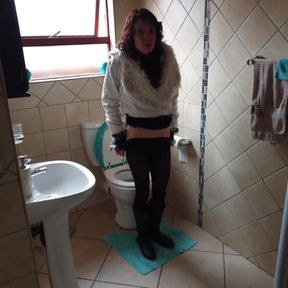 Skinny Slut Pissing with Her Legs Wide Open in the Toilet for Your Viewing