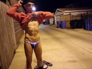 Hot Jock in a jockstrap strips naked in an empty back street and cums all over