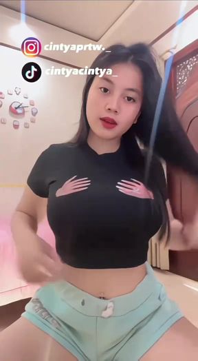 Indonesian babe with big tits shows off her non-nude indo tits