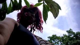 Thick-lipped ebony girl shows her tits in a public place