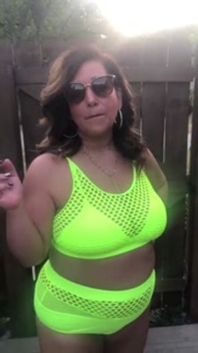 Curvy milf smoking outdoors