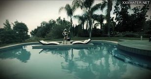 Linda enjoys herself by the pool