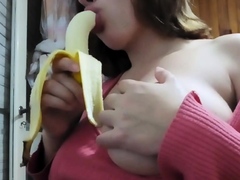 Big-Titted Latina Teen Sucks on Banana Like a Pro