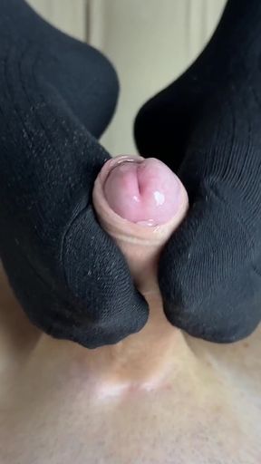 Masturbation in Bed with Sockjob and Cum on Feet in Black Socks