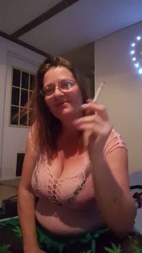 Smoking a cig, playing with toys, penis pump.