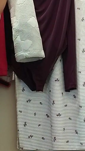Stunning moment from &quot;Sexy mom tries on pantyhose. Sexy brunette tries on clothes in fitting room.&quot;