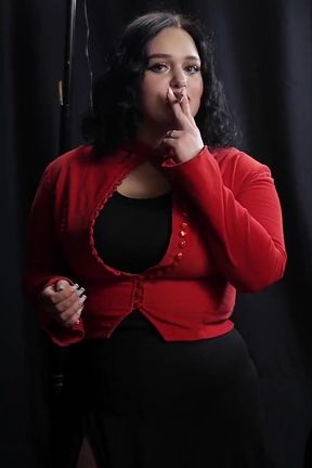 Curvy Brunette Smoking in Red Cardigan