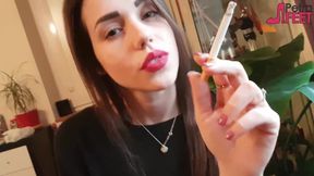 Smoking in close up with a beautiful girl