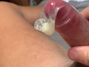 British boy jerks off and shoots his load into a condom (lots of hot thick cum)
