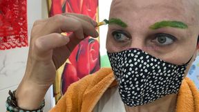 half head shave with neon green eyebrows dye