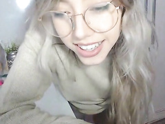Petite Chick with glasses masturbates