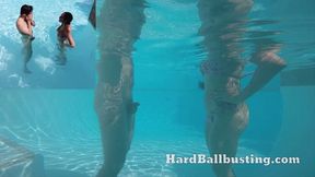 Lady Kneeing Balls Underwater in Pool
