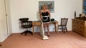 Hoovering with hoover junior in new French maid uniform