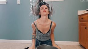 sage eldritch flipping her wet hair in wet clothes