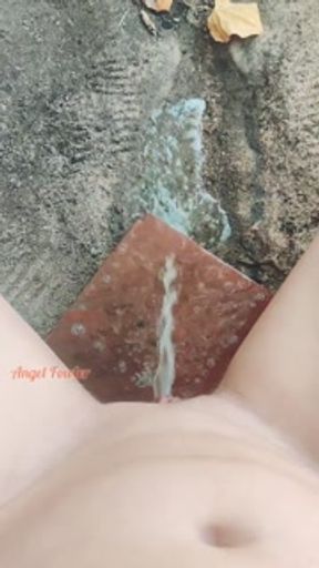 Pissing on tiles at a construction site from a big tasty pussy.