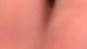 That is where she starts to play with her pussy, spreading her legs open so you can see...