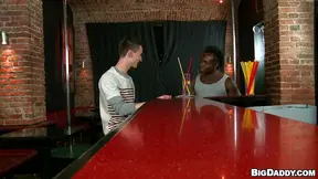 Black poofter and a twink enjoy some naughty banging in a bar