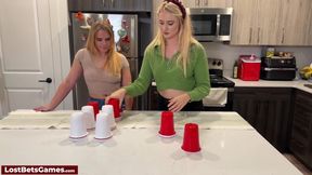 Taylor pairs with Maddie for a playful strip dice cup game