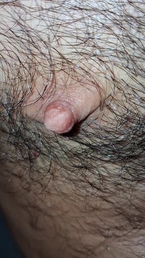 Male nipples in the foreground