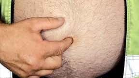 Bear Plays With His Belly Button