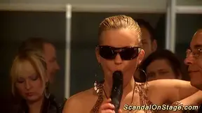 busty Darling fisting on public stage