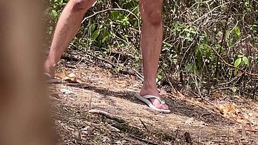 Boy caught peeing in the woods