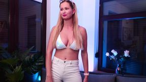 A beauty with BIG EYES dances in a bikini