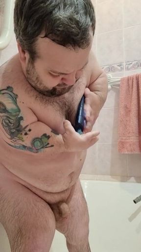 Midget is taking a shower