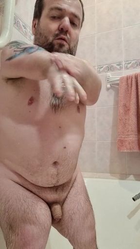 Midget is taking a shower