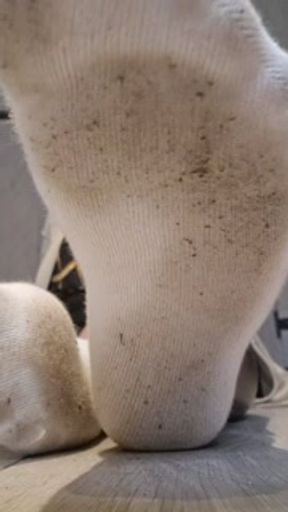 Play with my dirty white ankle socks while Im smoking.