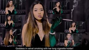 Goddess in velvet smoking with her long cigarette holder!