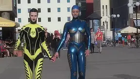 Through The City In A Tight Latex Costume - Watch4Fetish