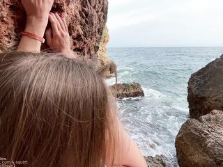 Amigo fucked the climber in the mouth and pussy right on the edge of the cliff