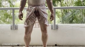 Randy straight guy wears skirt on hotel balcony