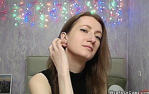 Brunette babe strips to bra on webcam solo show