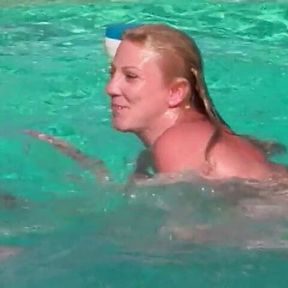 Sexy nympho has wild lesbian fun in pool with blonde