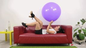 Petra blows up giant purple balloon (4K)